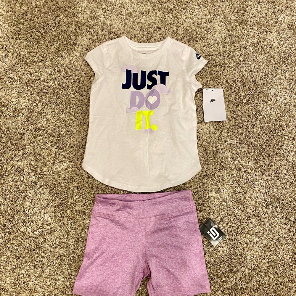 Nike Shirt and Purple Shorts
